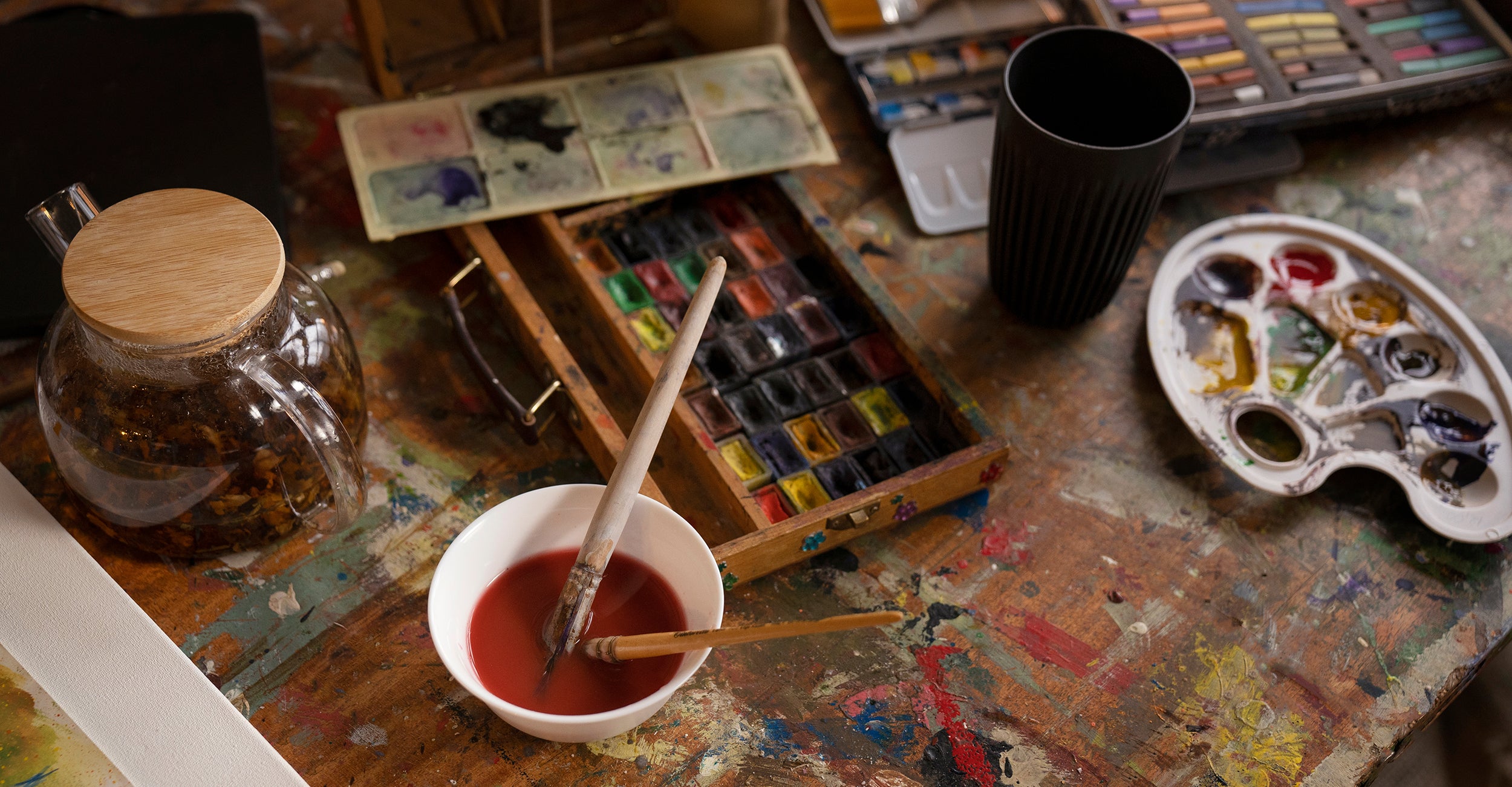 Art by the lake Schroon NY art supplies and art classes - table with art supplies, paints, chalk, etc